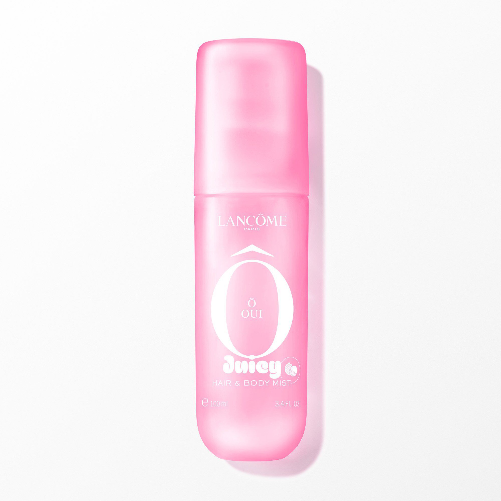 Un pulverizador rosa brillante de Lancome O OUI Juicy Hair & Body Mist.