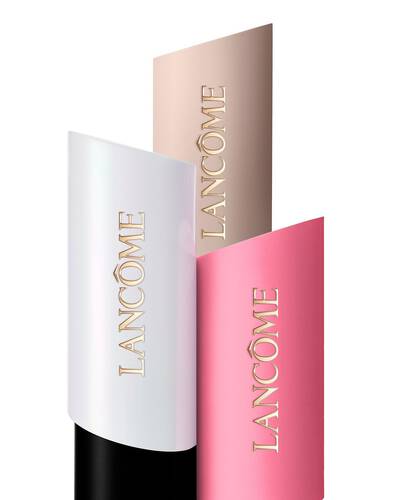 Arreglo escalonado de tres bases de maquillaje Lancome Teint Idole Shape Stick, iluminador y colorete en blanco, beige y rosa.