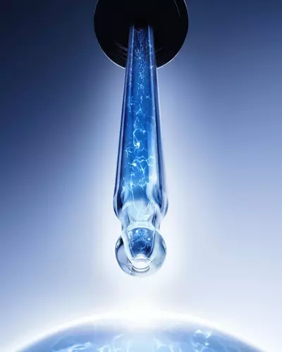 Genifique Ultimate Serum con aplicador de dosificador