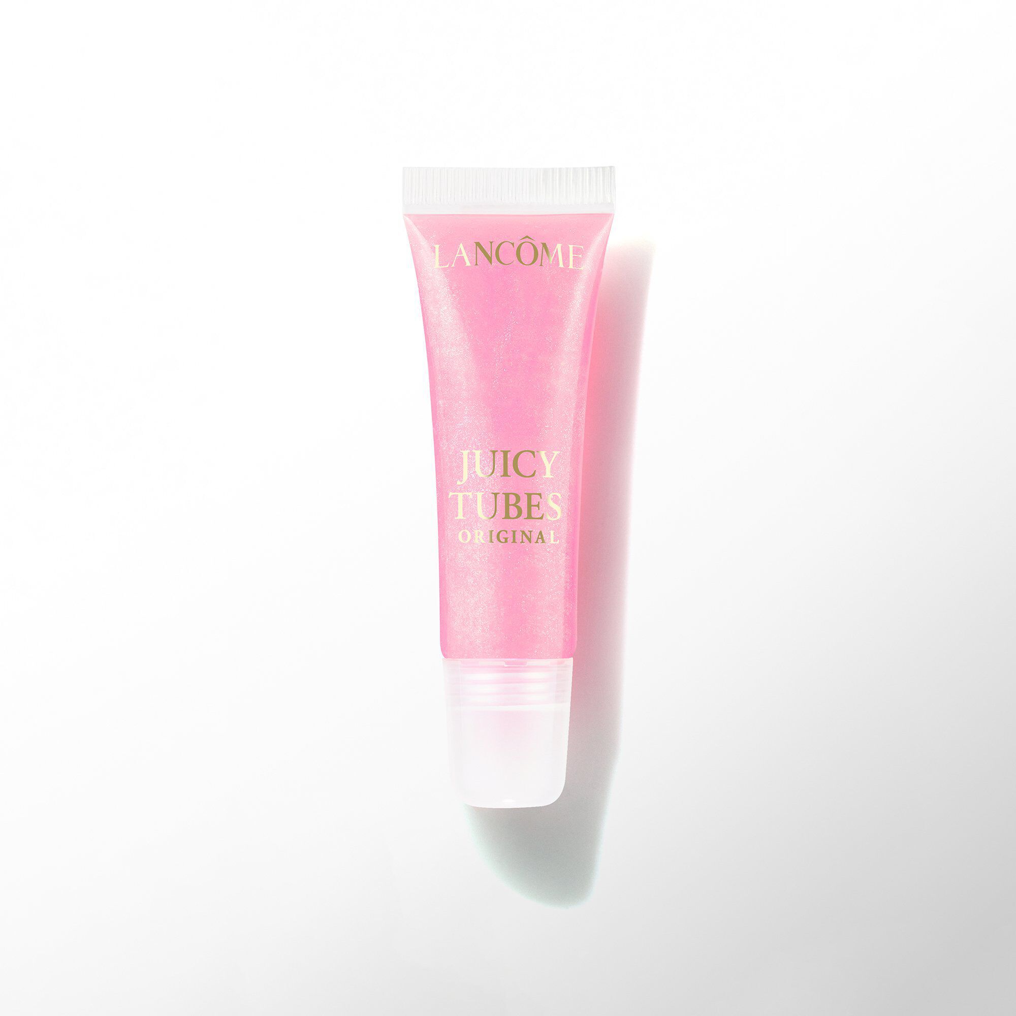 Un tubo de brillo de labios Lancome Juicy Tubes Original en un tono rosa brillante.