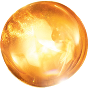 Esfera dorada brillante con un efecto de luz y destellos, creando una atmosfera magica y enigmatica.