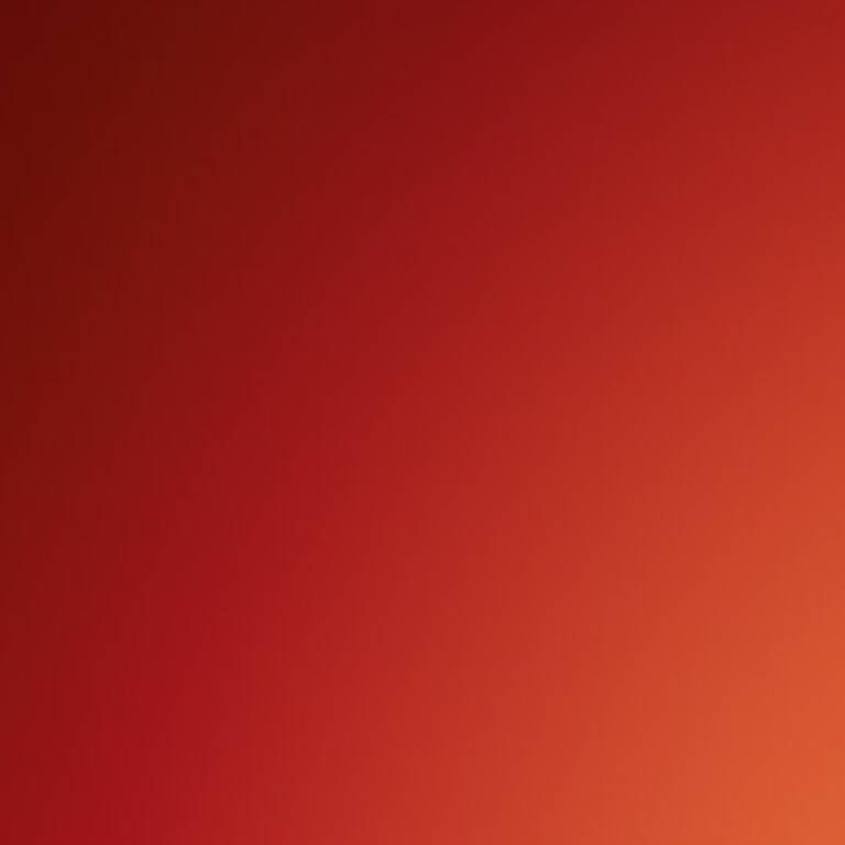 Tres labiales rojos con acabado brillante, destacados frente a un fondo en tonos naranja y rojo.
