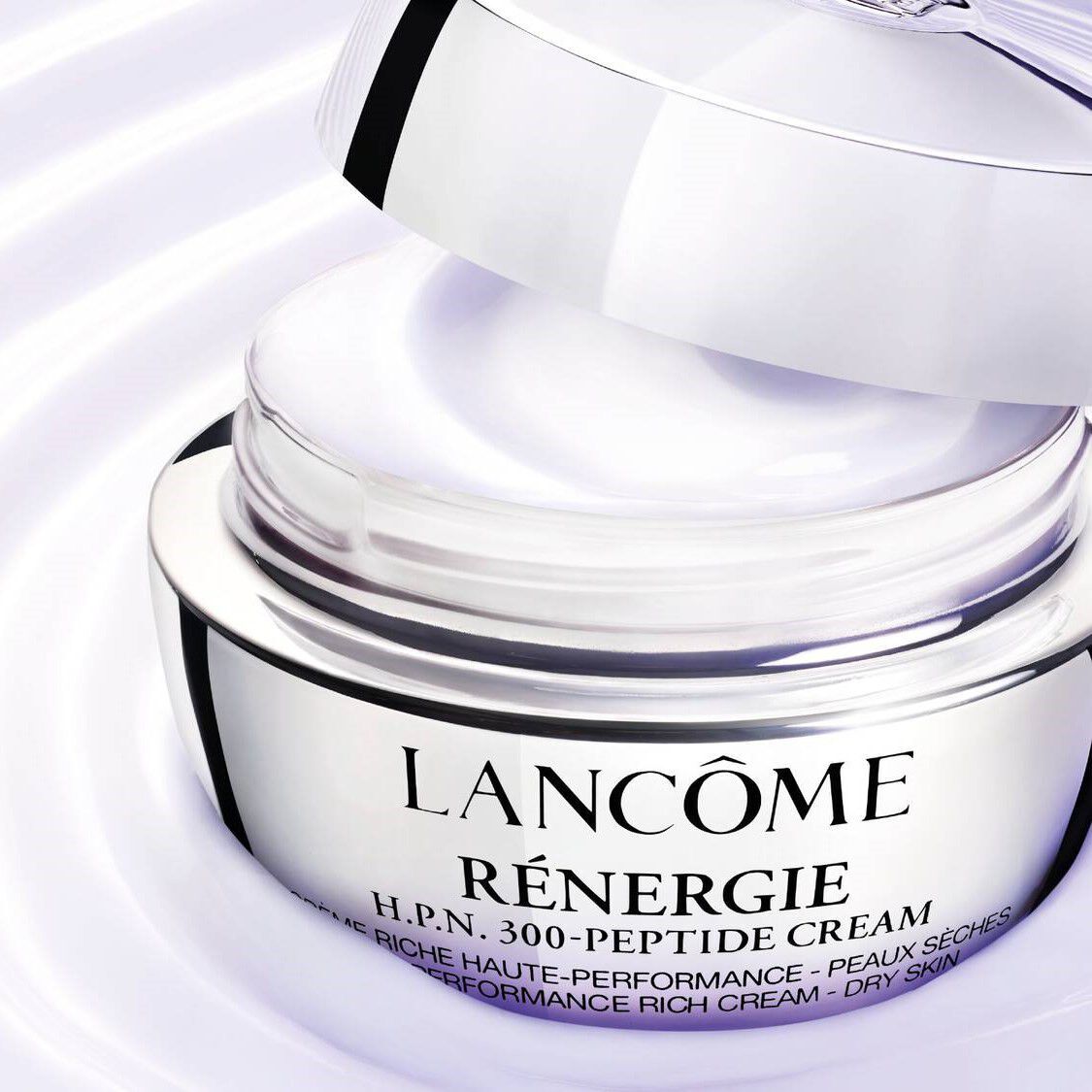 Crema hidratante Lancome Renergie H.P.N. 300-Peptide en un tarro elegante, ideal para piel seca.
