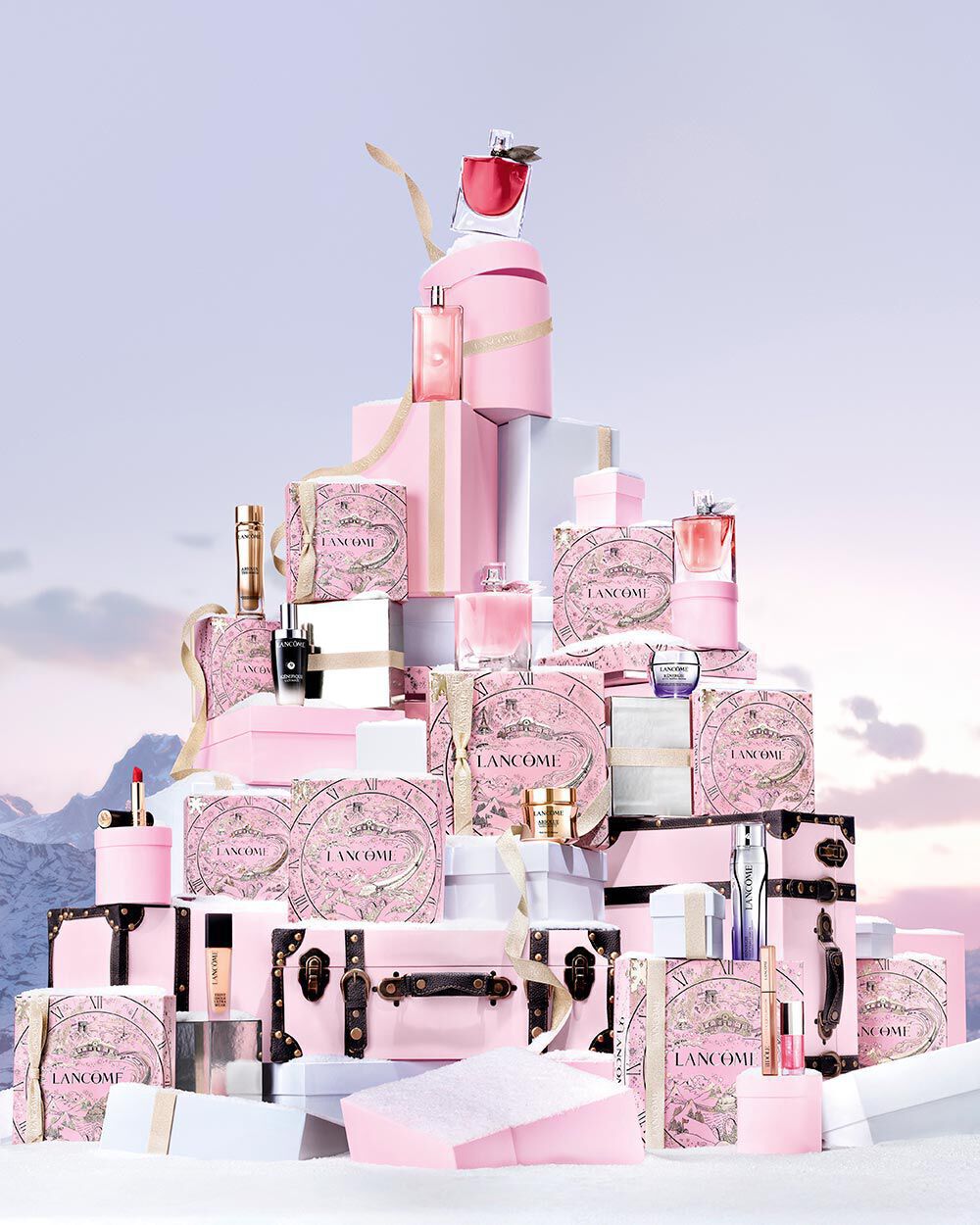 Lancome's Advanced Genfique Creme and Genifique Yeux Light-Pearl Serum displayed together on a neutral background.